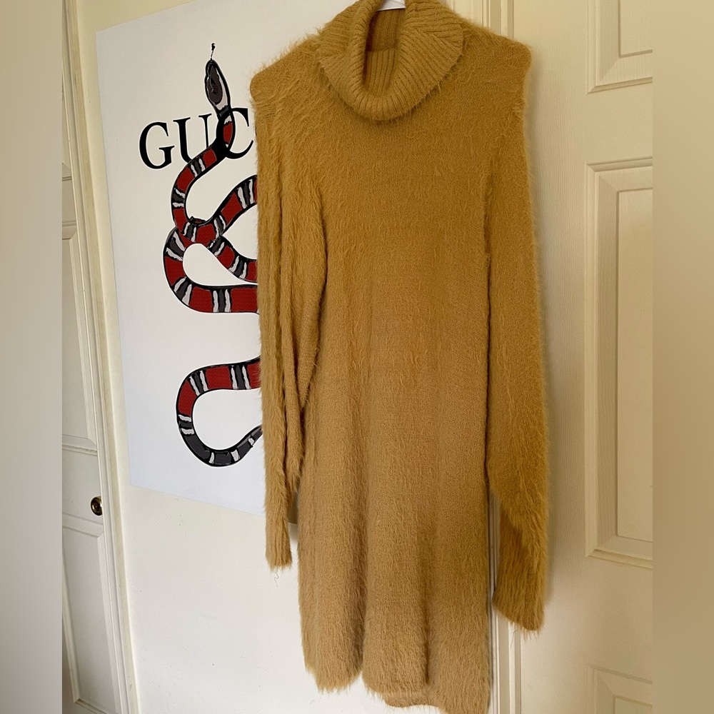 Woman’s long warm sweater